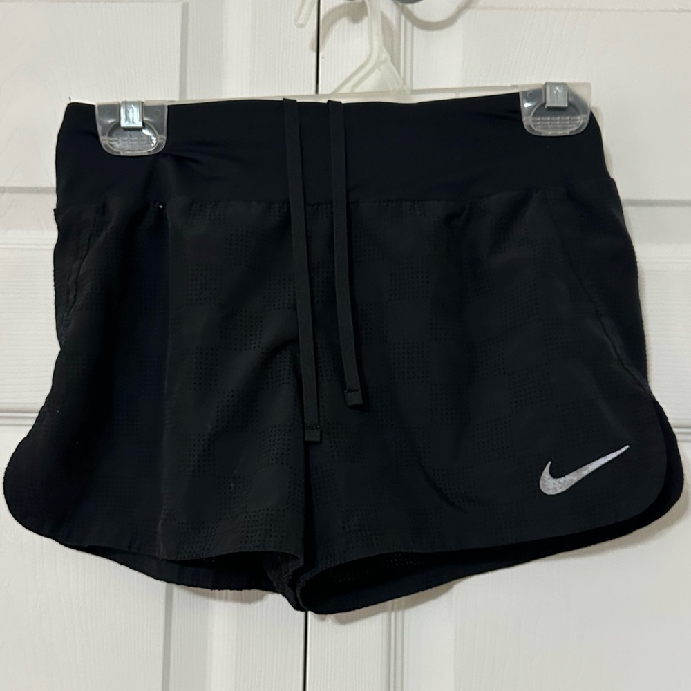 Nike Women's Black Mesh Athletic Shorts with Silver Logo